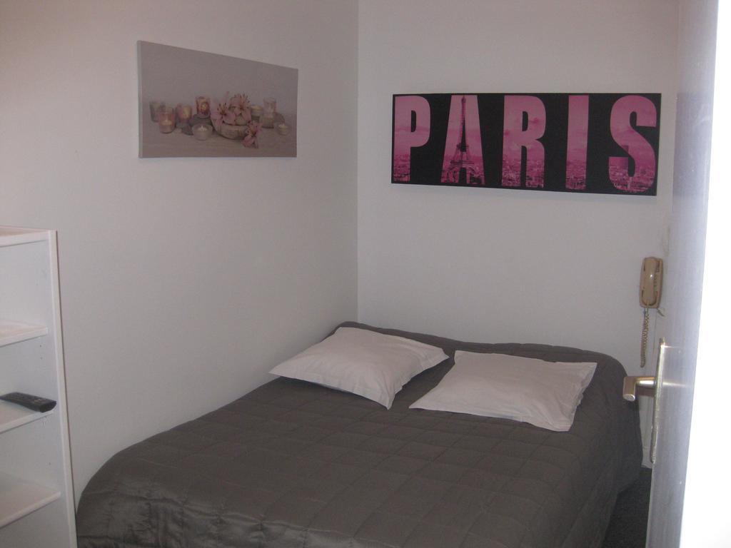 Le Monopole Hotell Reims Rum bild